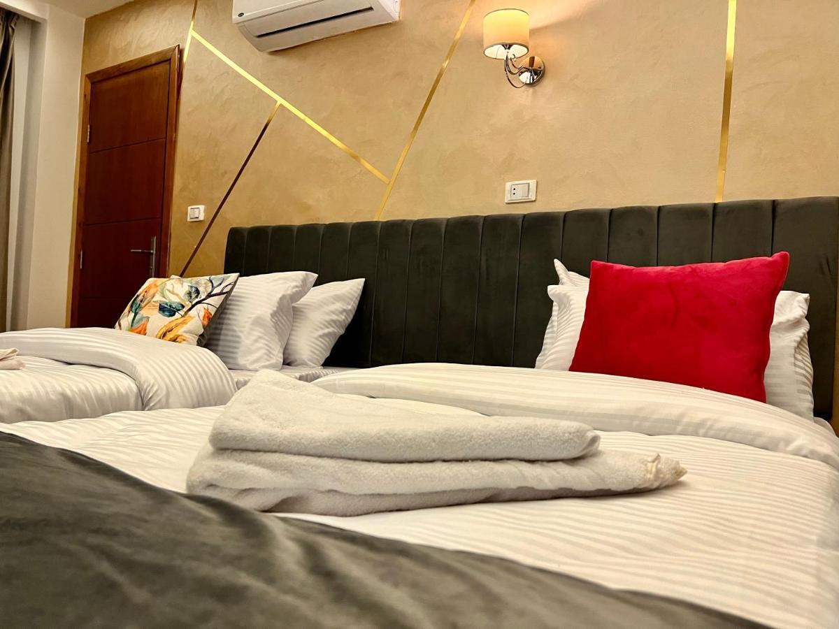 Grand Pyramids Inn Kafret el-Gabal Exteriör bild