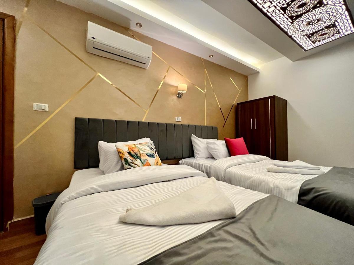 Grand Pyramids Inn Kafret el-Gabal Exteriör bild