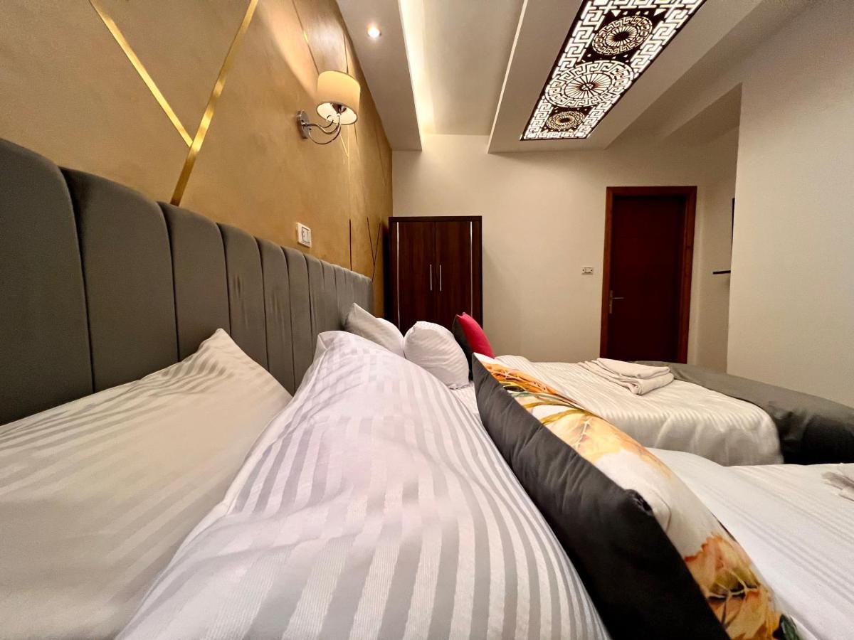 Grand Pyramids Inn Kafret el-Gabal Exteriör bild
