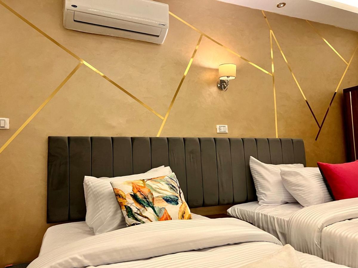 Grand Pyramids Inn Kafret el-Gabal Exteriör bild