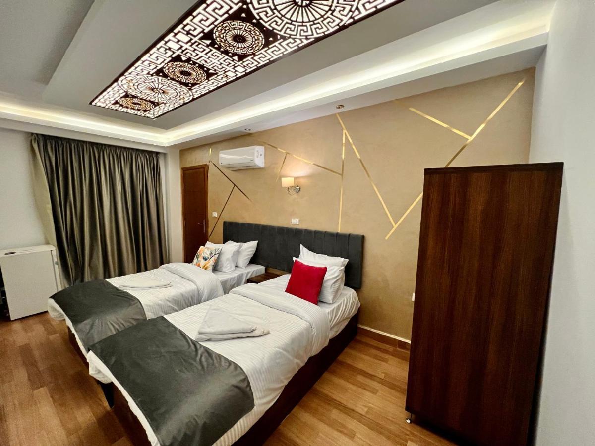 Grand Pyramids Inn Kafret el-Gabal Exteriör bild