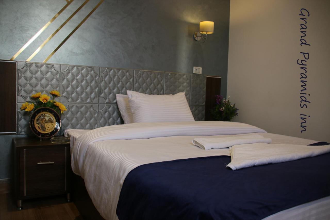 Grand Pyramids Inn Kafret el-Gabal Exteriör bild