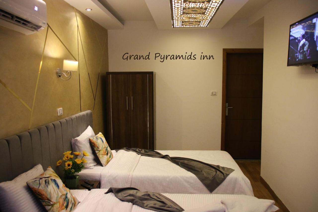 Grand Pyramids Inn Kafret el-Gabal Exteriör bild