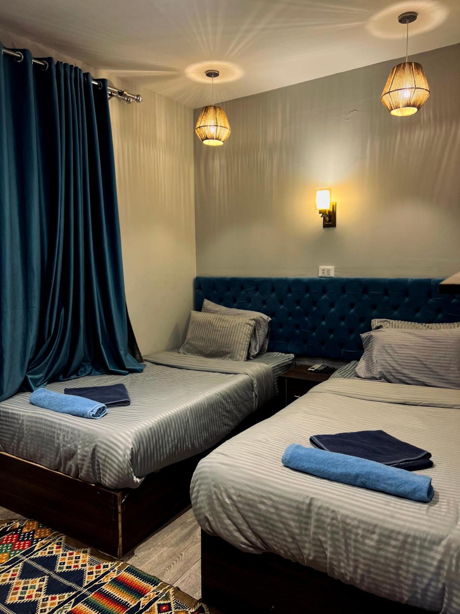 Grand Pyramids Inn Kafret el-Gabal Exteriör bild