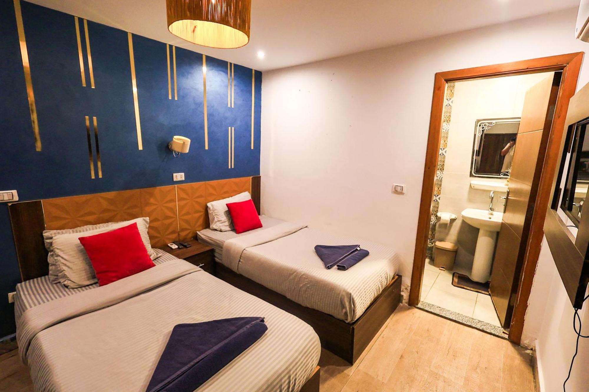 Grand Pyramids Inn Kafret el-Gabal Exteriör bild