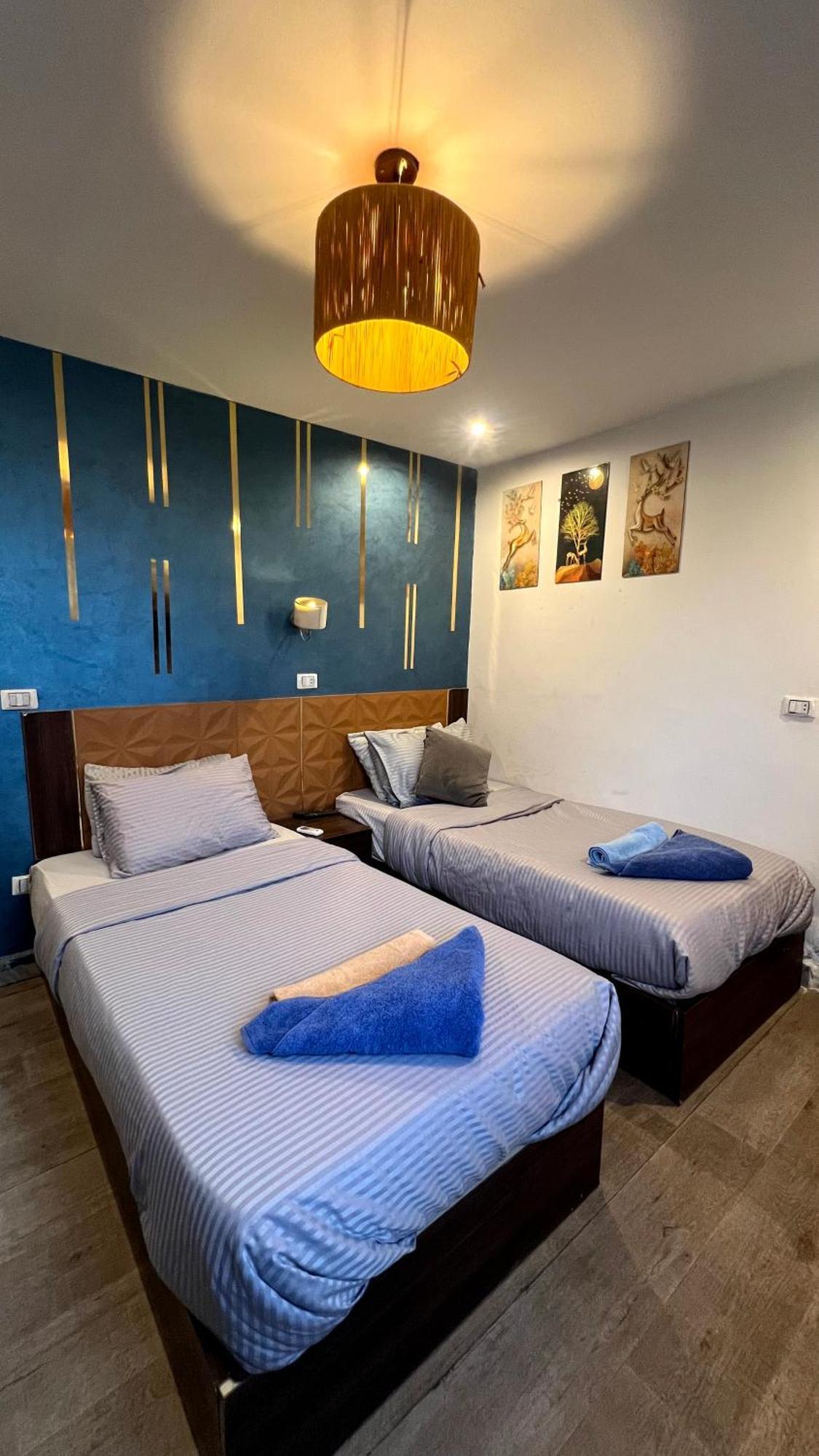 Grand Pyramids Inn Kafret el-Gabal Exteriör bild