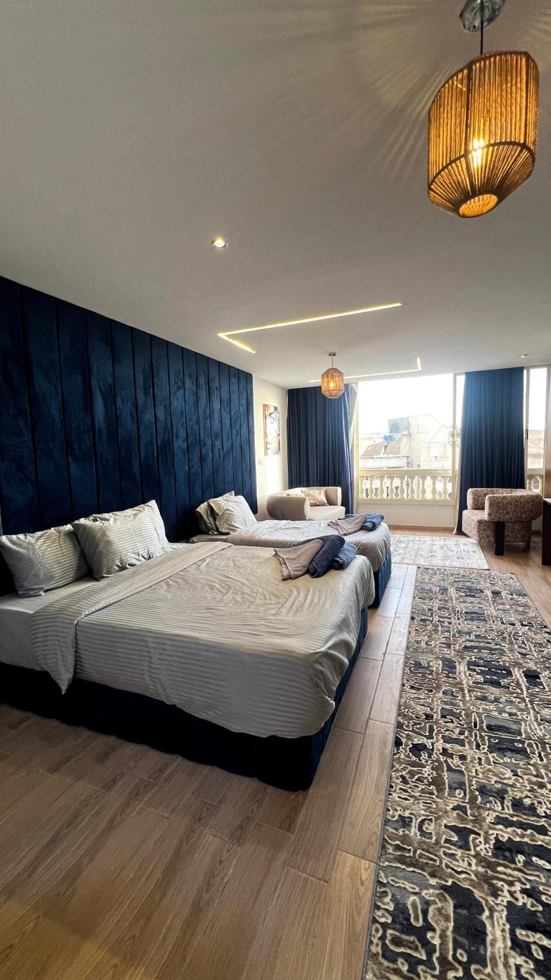 Grand Pyramids Inn Kafret el-Gabal Exteriör bild
